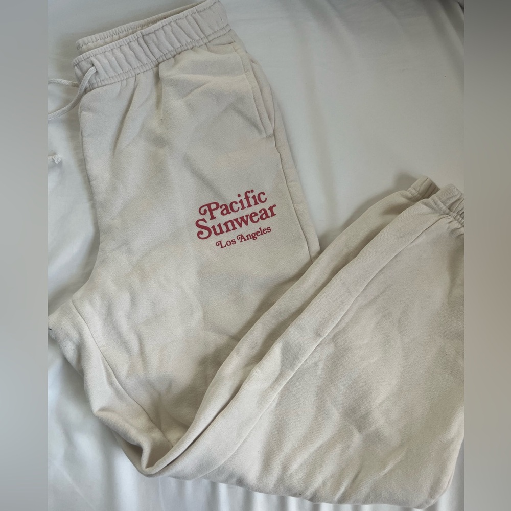 Pacsun cream and red low rise sweatpants in a size small